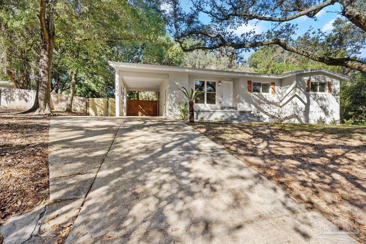 5149 Crestwood Road Pensacola, FL 32503 - Photo 51 of 53 a view of a house with a yard