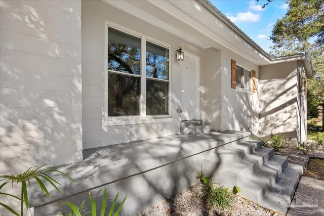 a house with trees in front of it