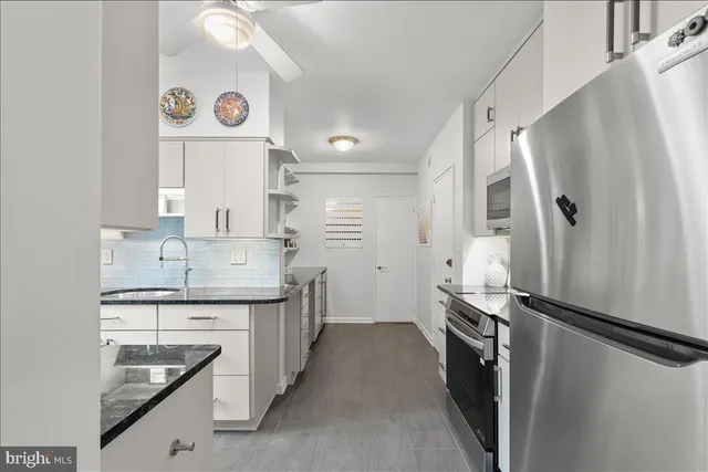 a view of utility room and hall