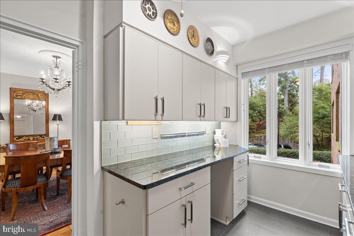 4301 Massachusetts Avenue Northwest, Unit A304 Washington, DC 20016 - Photo 14 of 38 Kitchen with bulit-in desk
