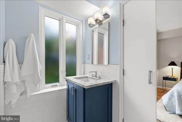 a bathroom with a shower and toilet