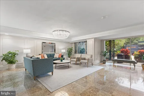 a kitchen with cabinets and wooden floor