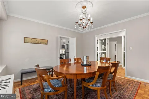 a kitchen with granite countertop a sink stainless steel appliances and cabinets