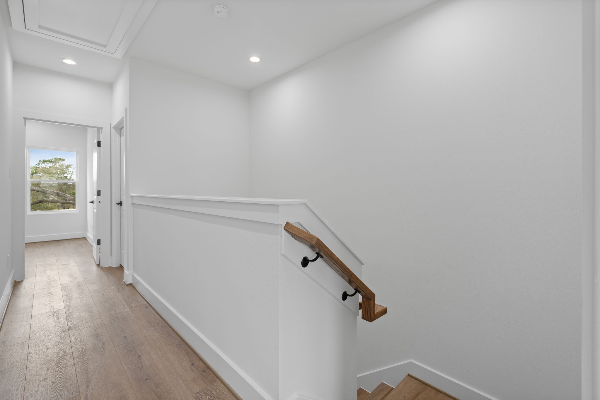 826 Curtin Street, Unit F Houston, TX 77018 - Photo 17 of 37 wooden floor in an empty room