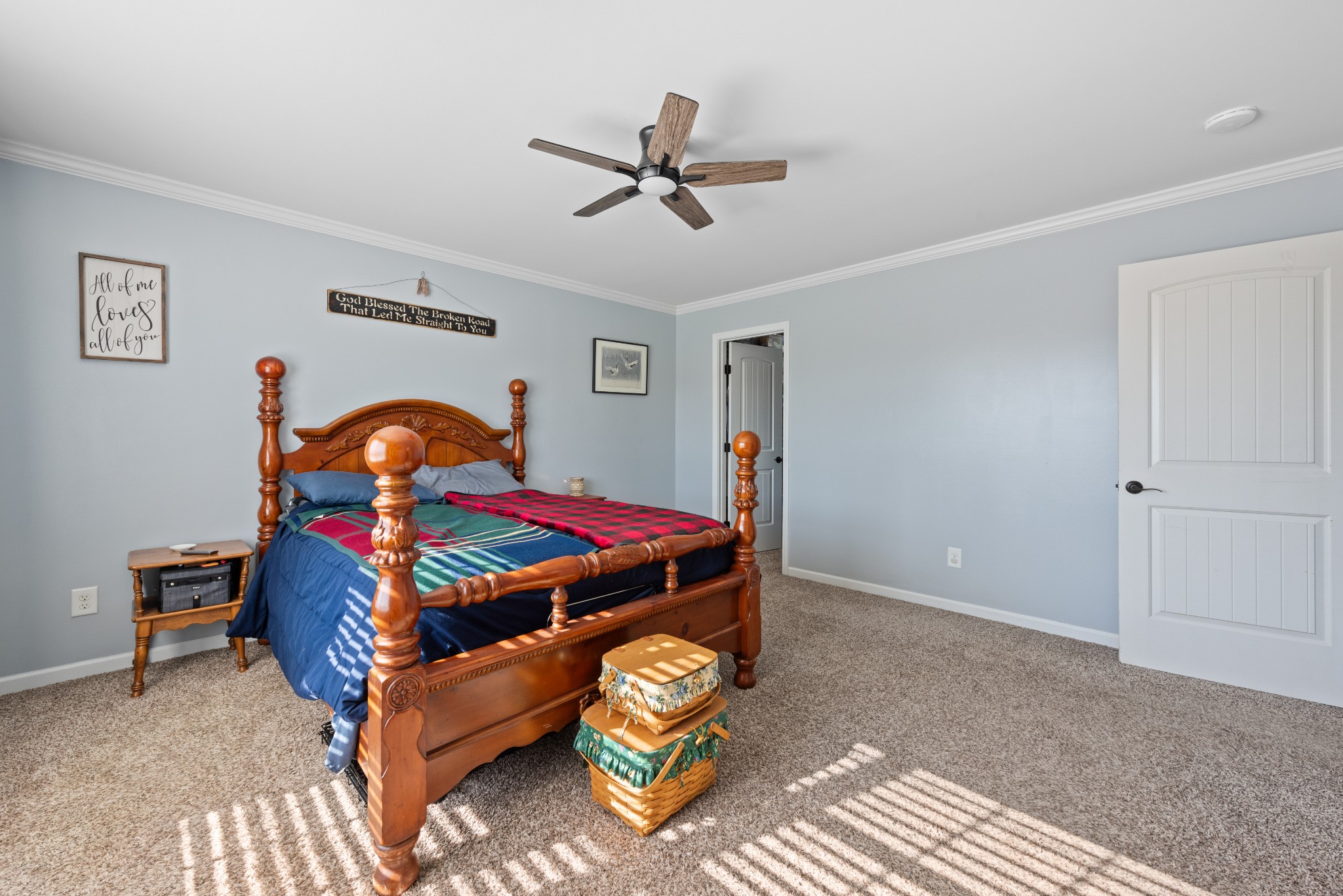 3758 Suiter Road Clarksville, TN 37040 - Photo 16 of 33 a bedroom with a bed and a chandelier