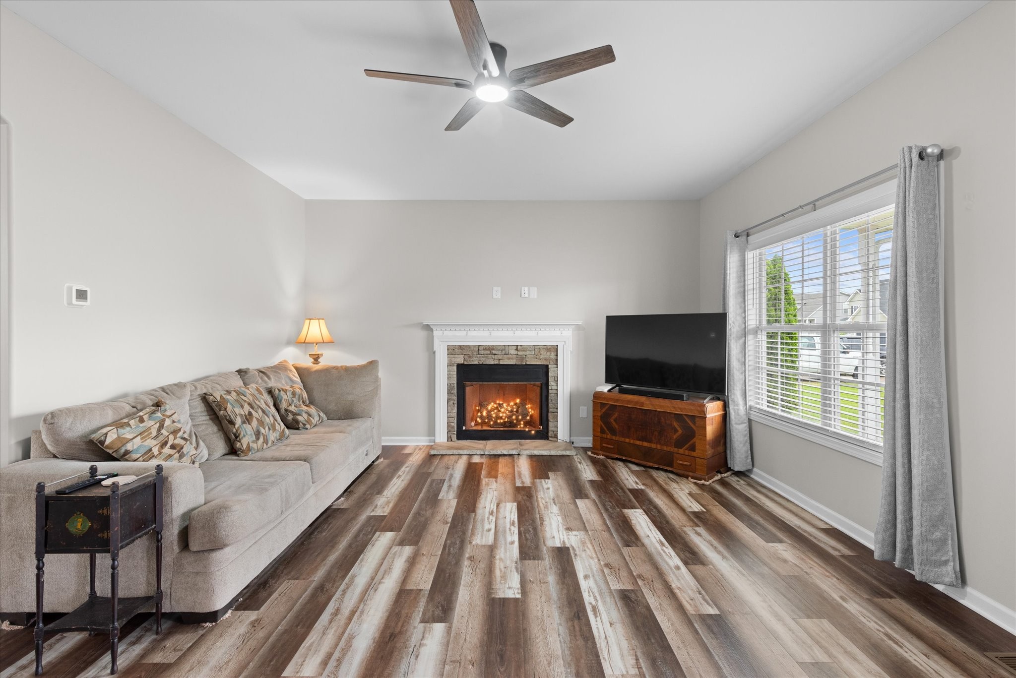 3758 Suiter Road Clarksville, TN 37040 - Photo 6 of 33 a living room with furniture and a flat screen tv