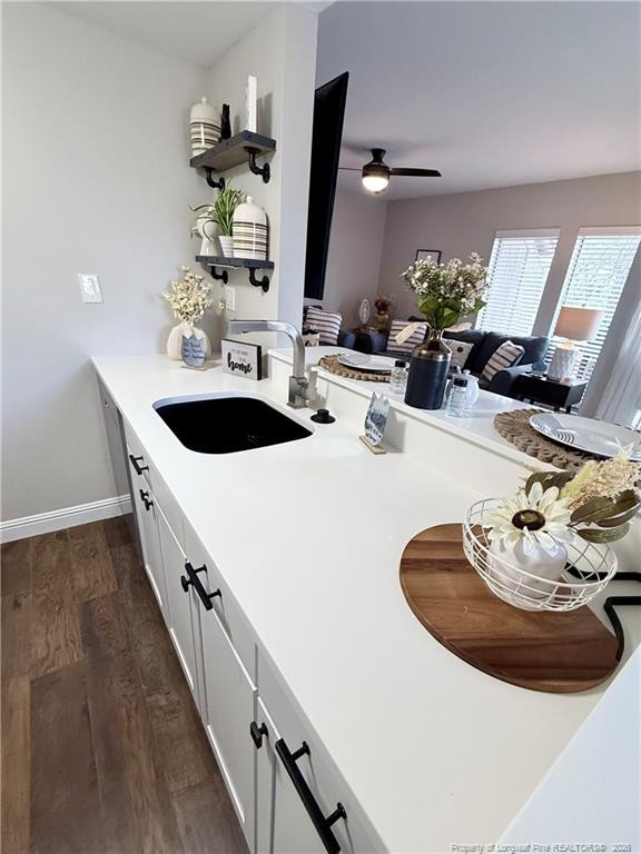 5 Pine Tree Road Pinehurst, NC 28374 - Photo 14 of 45 a kitchen with sink and stove