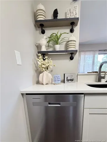 a close view of shoes and cabinets