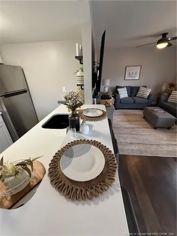 a kitchen with a sink and a stove