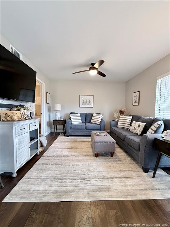 5 Pine Tree Road Pinehurst, NC 28374 - Photo 23 of 45 a living room with furniture and a flat screen tv