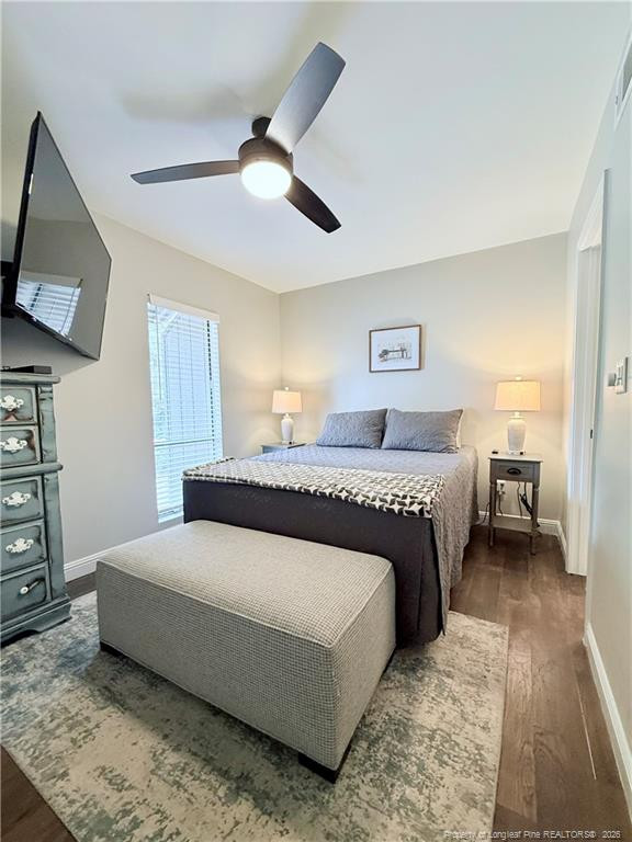 5 Pine Tree Road Pinehurst, NC 28374 - Photo 34 of 45 a bedroom with a large bed and a tv