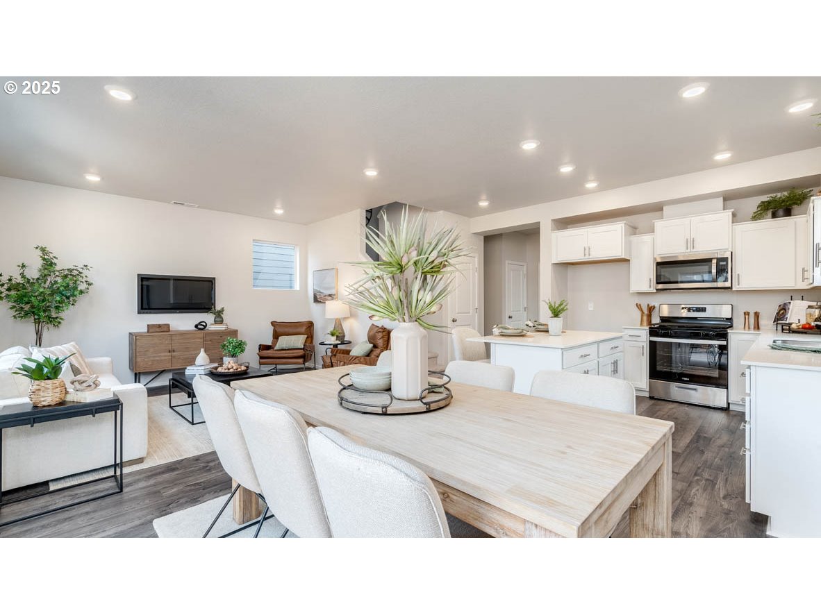 2805 U Street Springfield, OR 97477 - Photo 15 of 31 a kitchen with a table and chairs in it