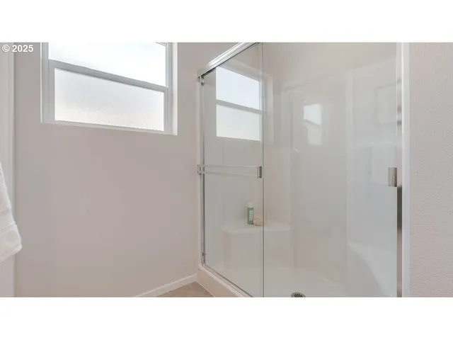 a bathroom with a sink and a shower