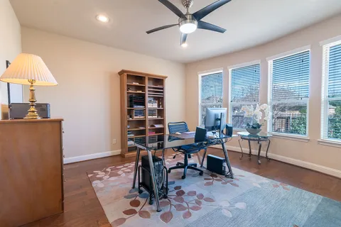 a workspace with furniture window and outside view