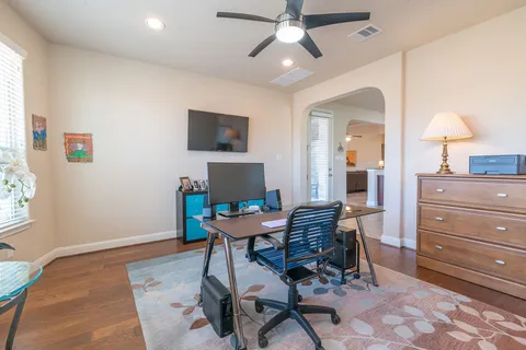 a workspace with furniture and window