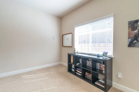 a room with furniture and window