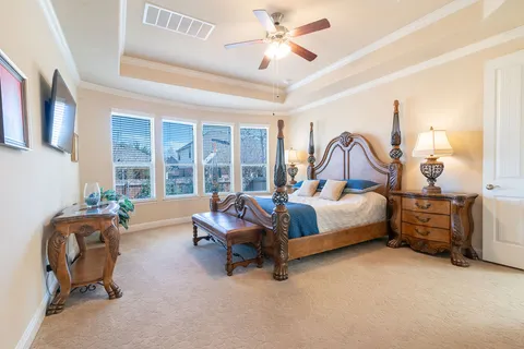 a bed room with furniture and a window