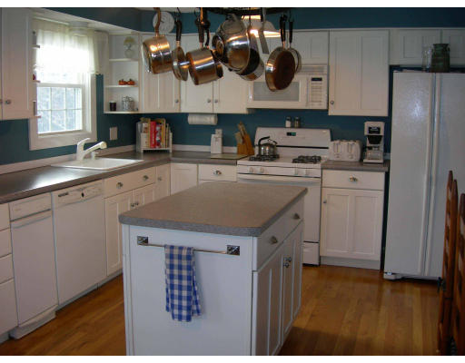 5 Michael Road Maynard, MA 01754 - Photo 3 of 9 a kitchen with a sink dishwasher and a refrigerator