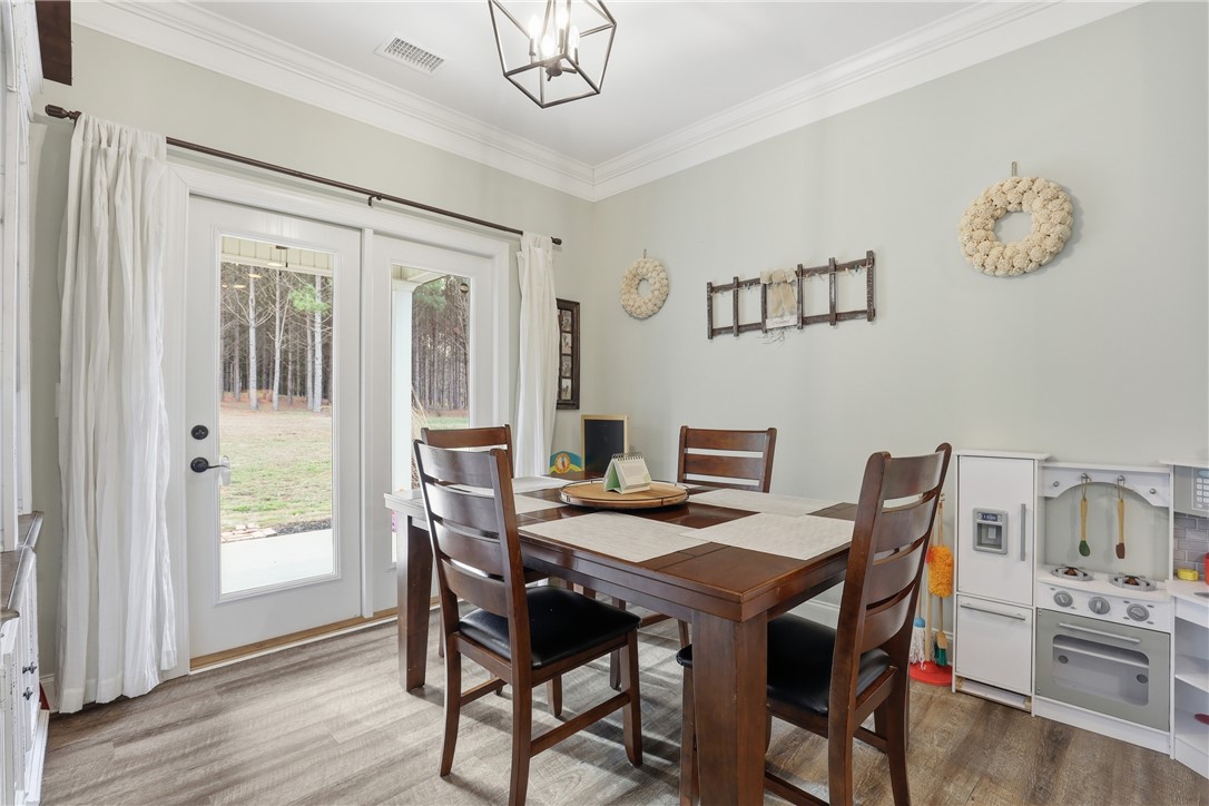 127 West Stewart Street Pelzer, SC 29669 - Photo 20 of 23 This dining area features a bright atmosphere, perfect for meals and gatherings.