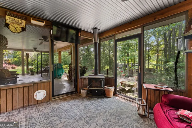 a kitchen with stainless steel appliances granite countertop cabinets a sink and a stove