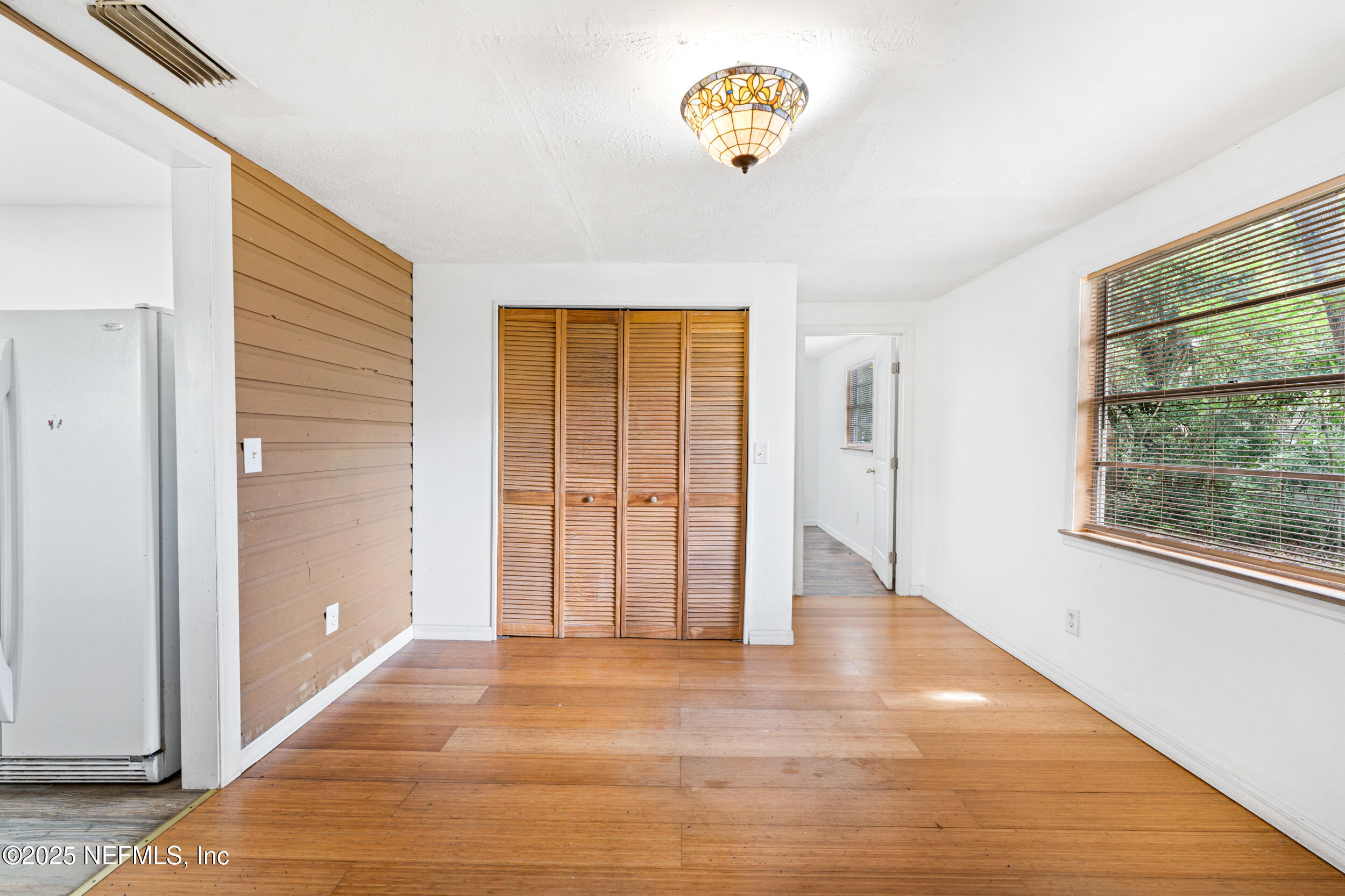 610 Division Street Fernandina Beach, FL 32034 - Photo 21 of 40 a view of an entryway with wooden floor