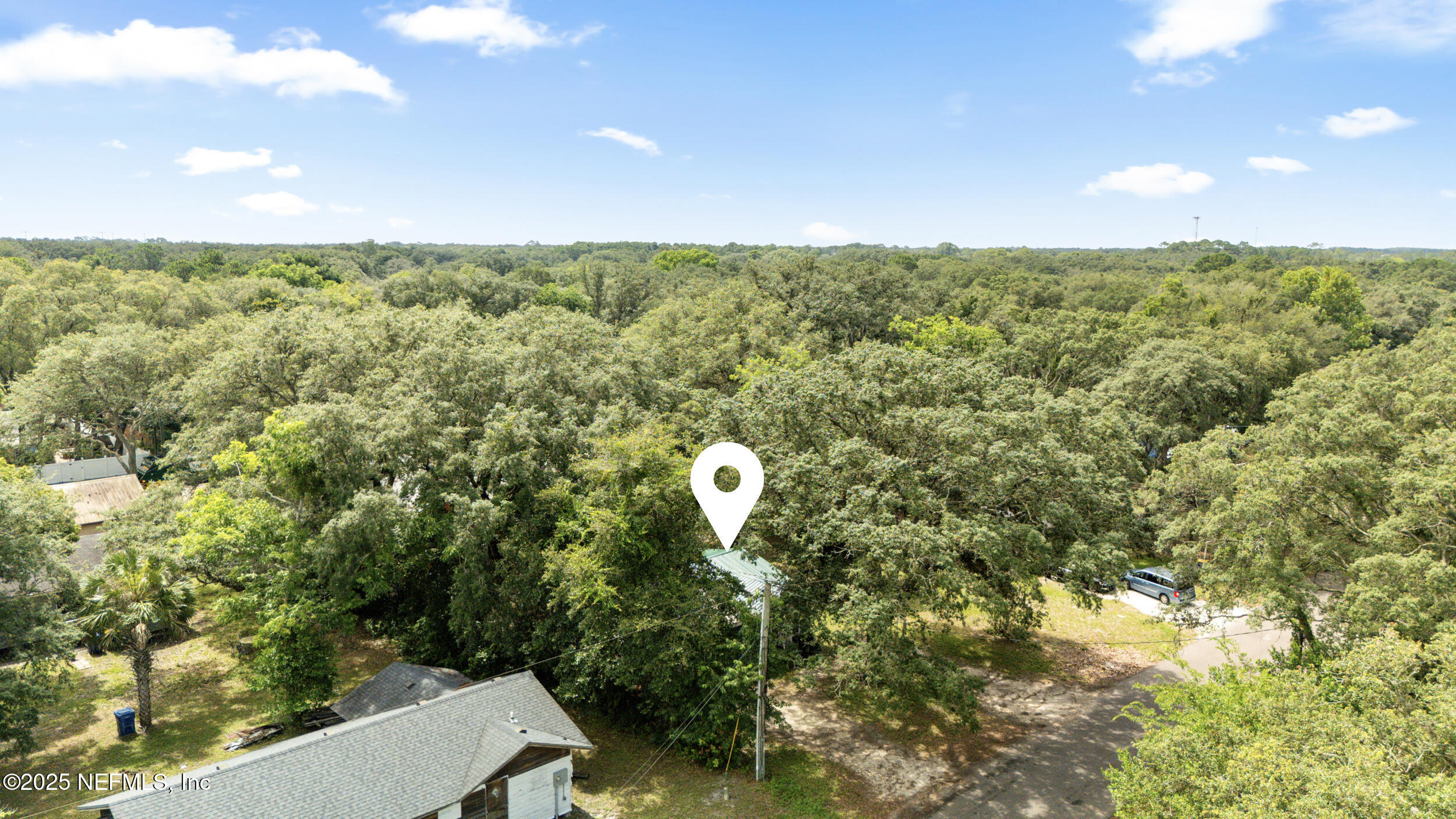 610 Division Street Fernandina Beach, FL 32034 - Photo 29 of 40 a view of a field with lots of bushes