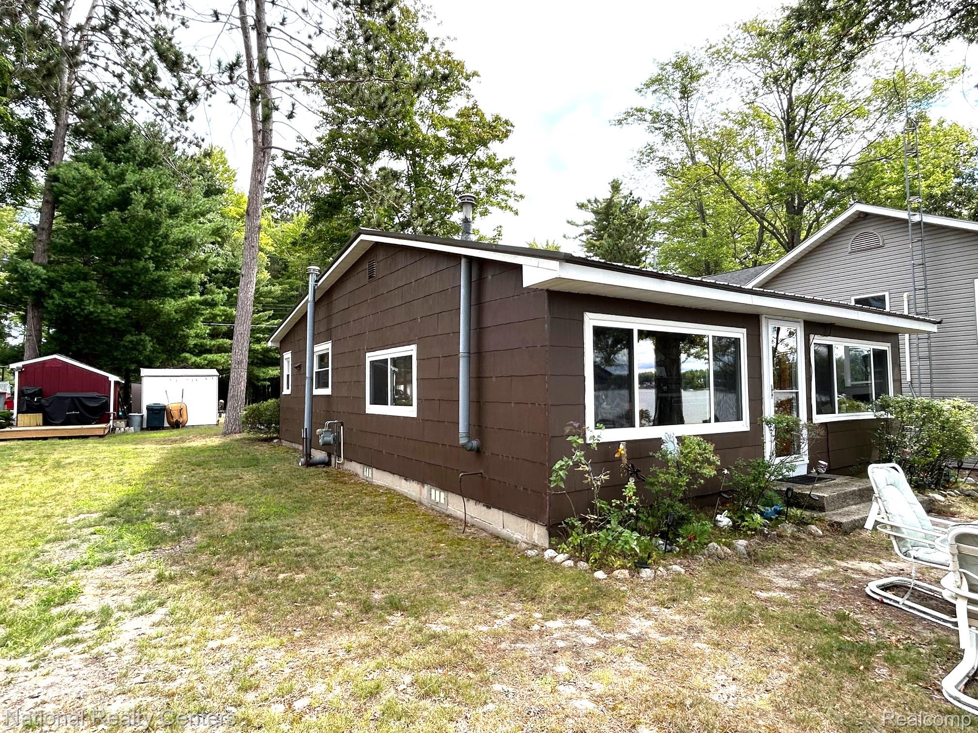 4951 Kokosing Road Hale, MI 48739 - Photo 3 of 37 View of right side of the house.