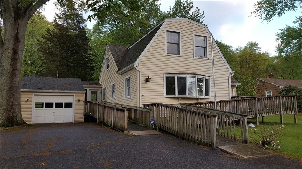79 Stevenson Road Fairfield, CT 06825 - Photo 1 of 1 a view of a house with a yard