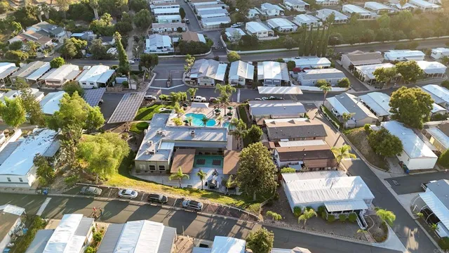 an aerial view of a house with a garden