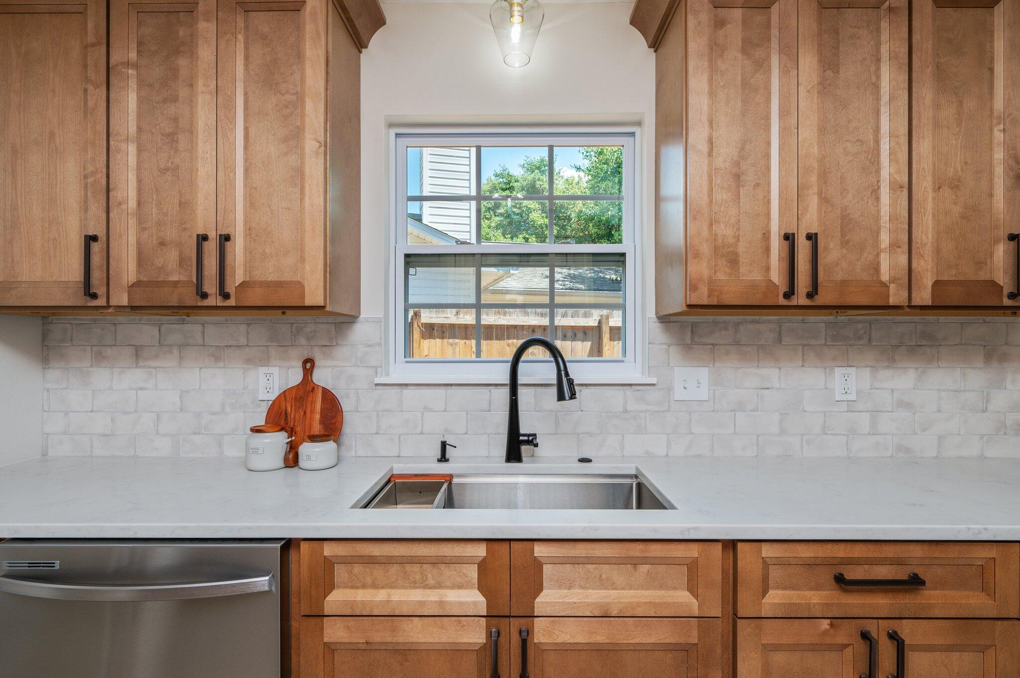 55 Ruby Circle Mary Esther, FL 32569 - Photo 17 of 51 a kitchen with stainless steel appliances granite countertop a sink and a cabinets