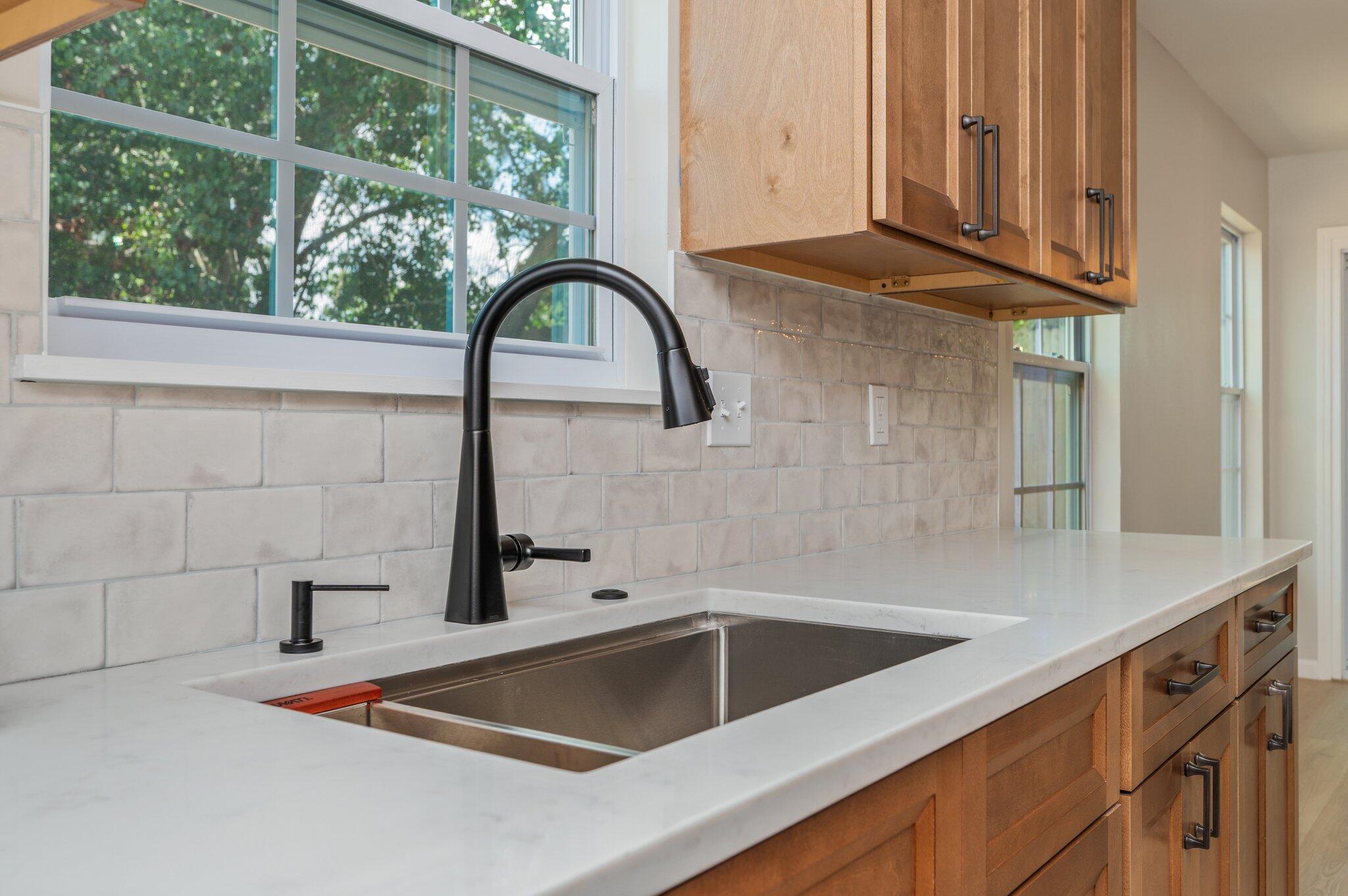 55 Ruby Circle Mary Esther, FL 32569 - Photo 20 of 51 a kitchen with a sink and a window
