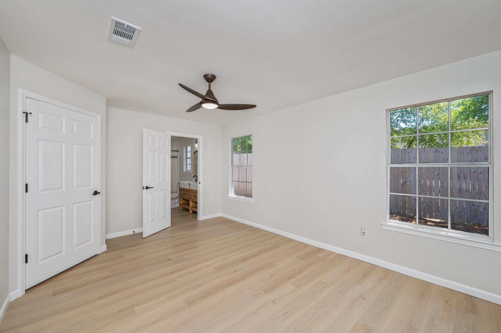 55 Ruby Circle Mary Esther, FL 32569 - Photo 26 of 51 a view of empty room with wooden floor and fan