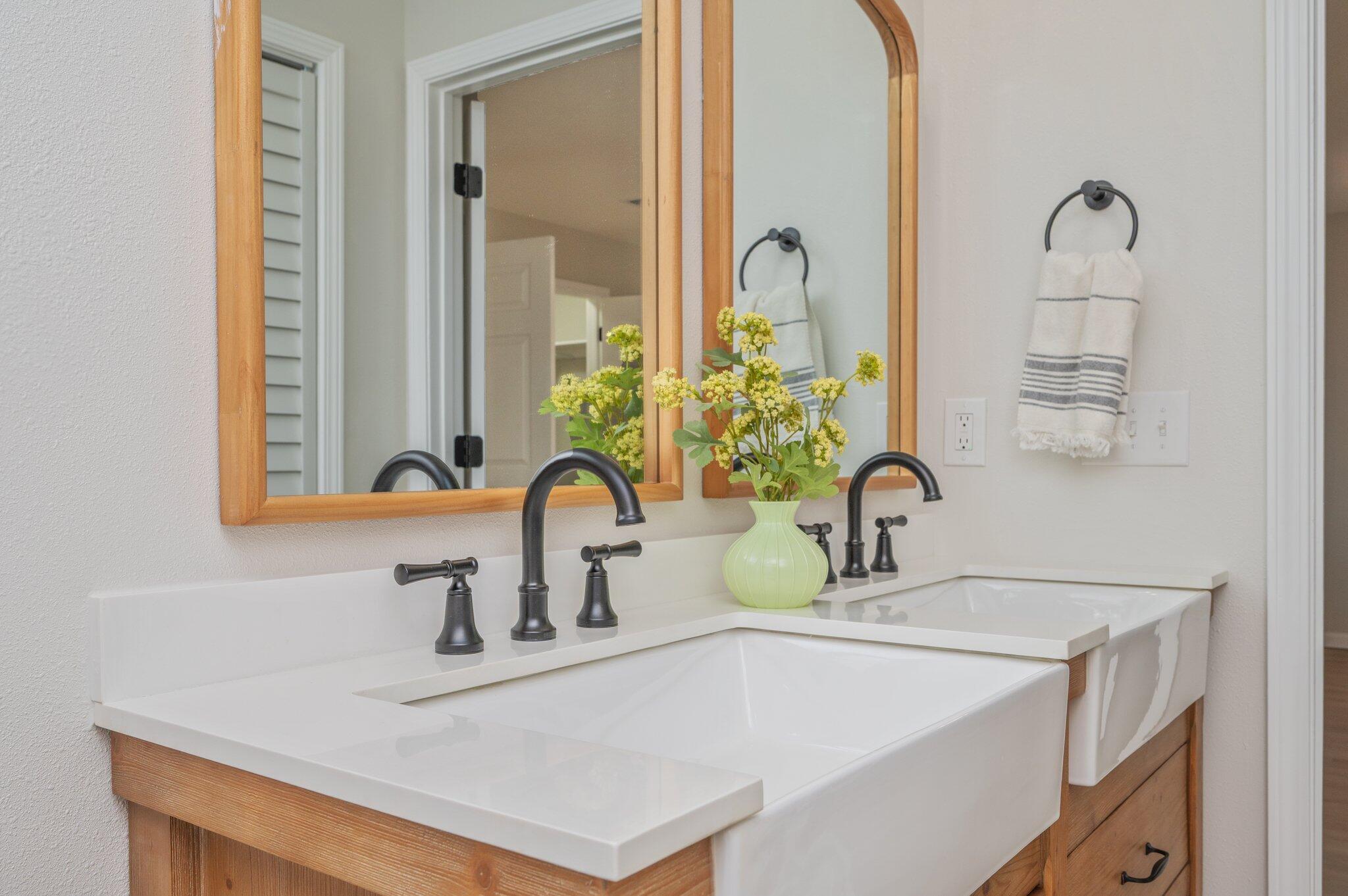 55 Ruby Circle Mary Esther, FL 32569 - Photo 30 of 51 a bathroom with a sink and a mirror