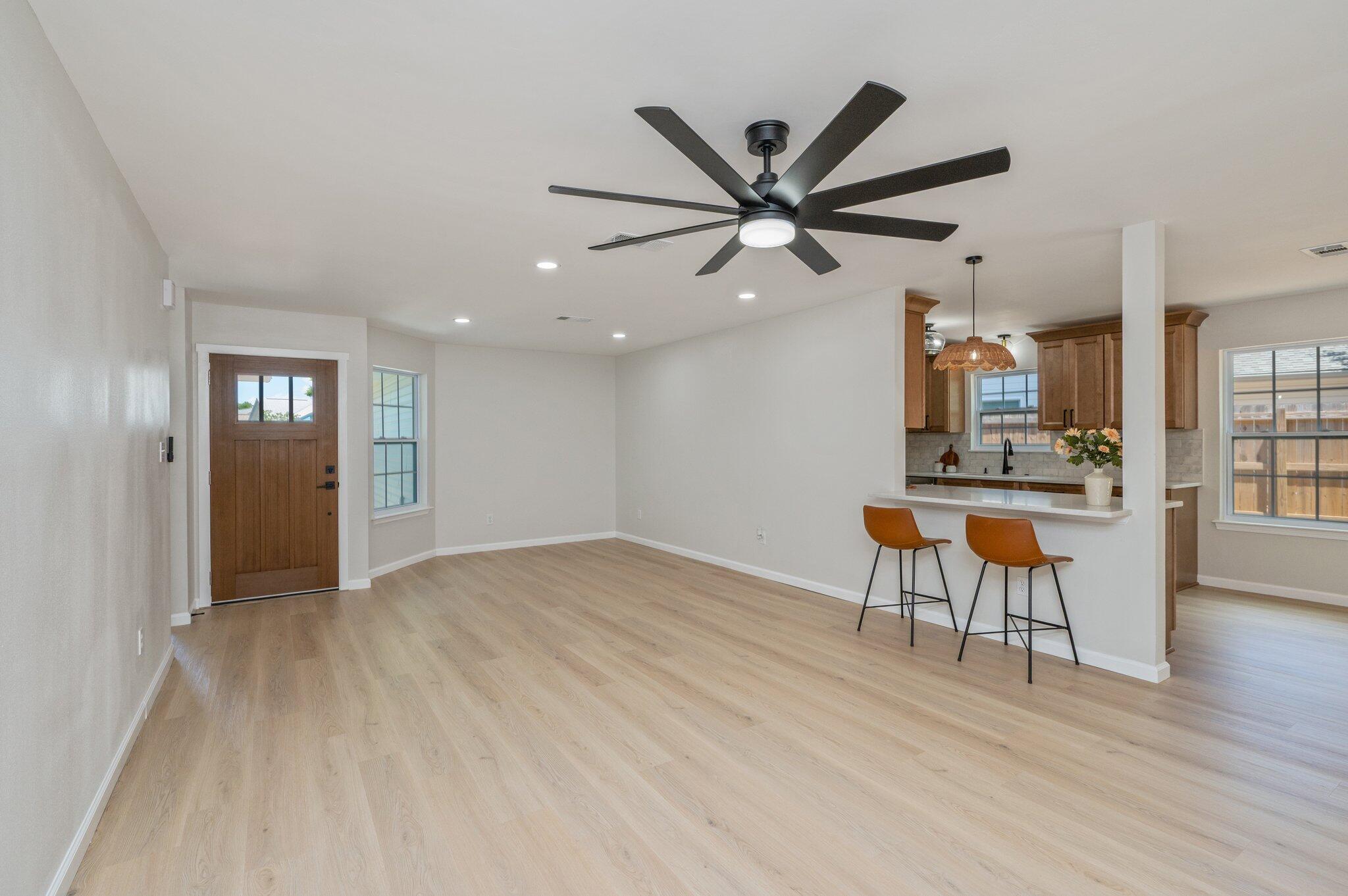 55 Ruby Circle Mary Esther, FL 32569 - Photo 4 of 51 a view of a livingroom with furniture and a kitchen view