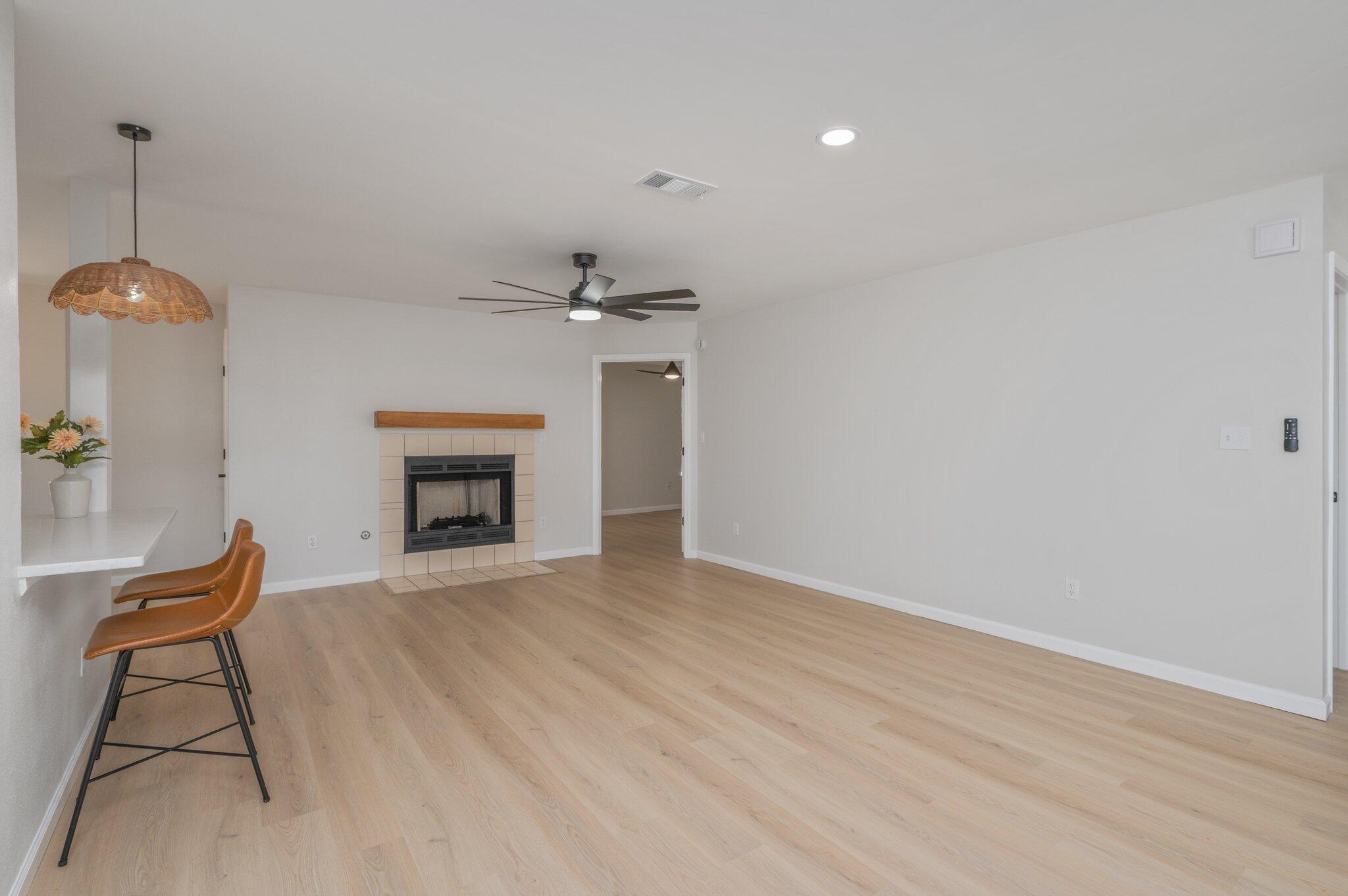 55 Ruby Circle Mary Esther, FL 32569 - Photo 9 of 51 a view of an empty room with a fireplace and cabinet