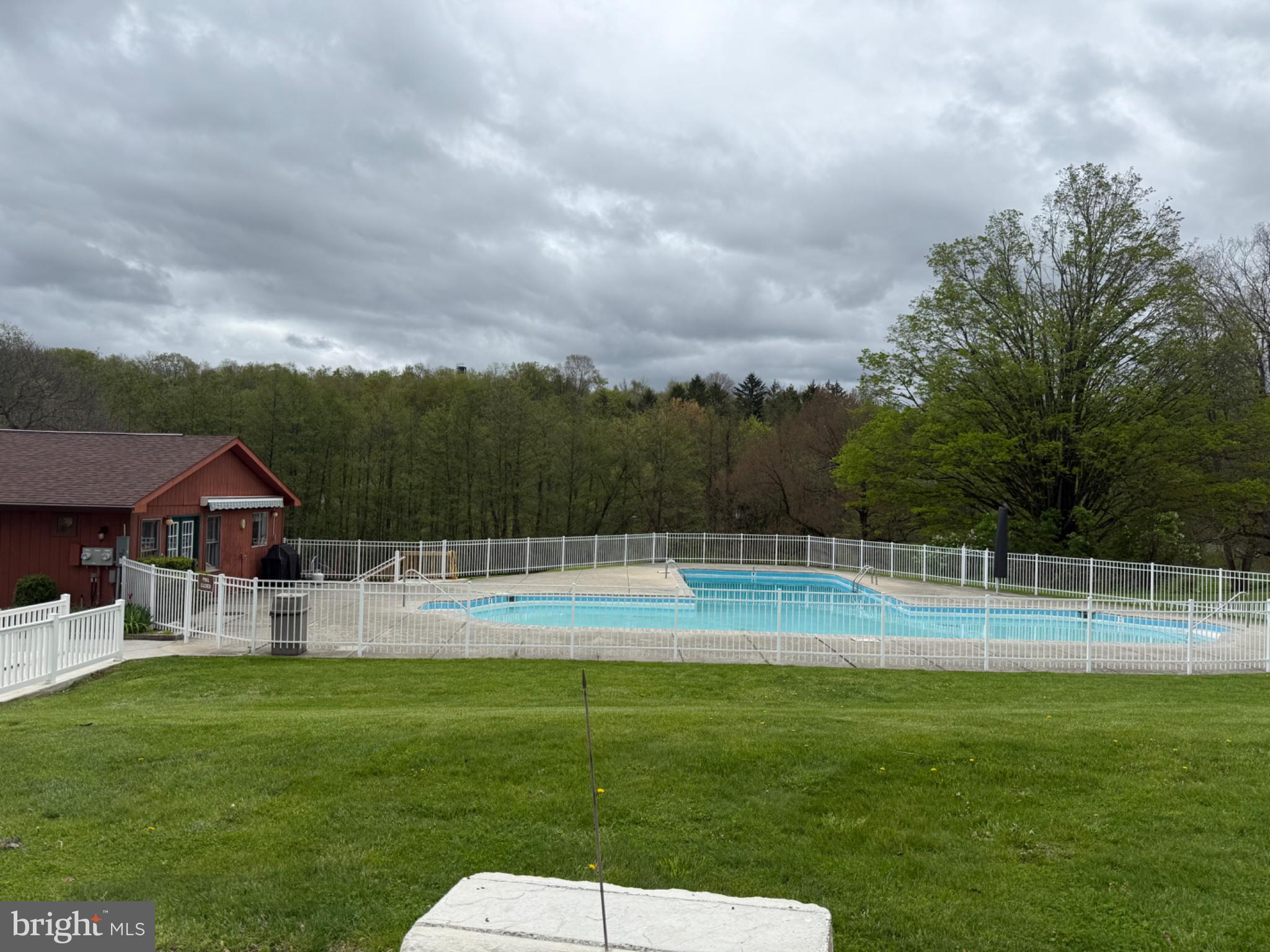5 Revolutionary Road Mount Bethel, PA 18343 - Photo 28 of 28 Serene poolside retreat in nature.