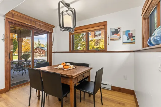 a table and chairs in front of a building