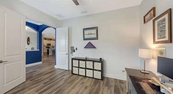 a bathroom with a sink vanity granite toilet and shower