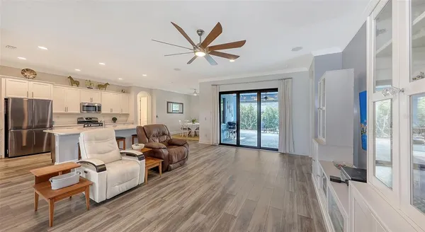 a view of a lake with houses in the background