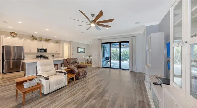 a view of a lake with houses in the background