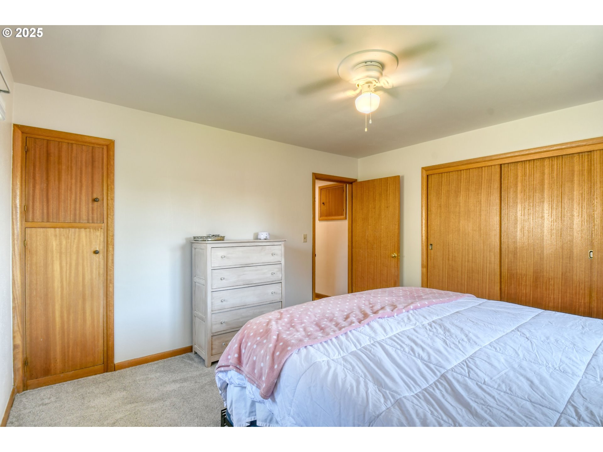 721 Northwest 10th Street Pendleton, OR 97801 - Photo 18 of 36 a bedroom with a bed and a closet