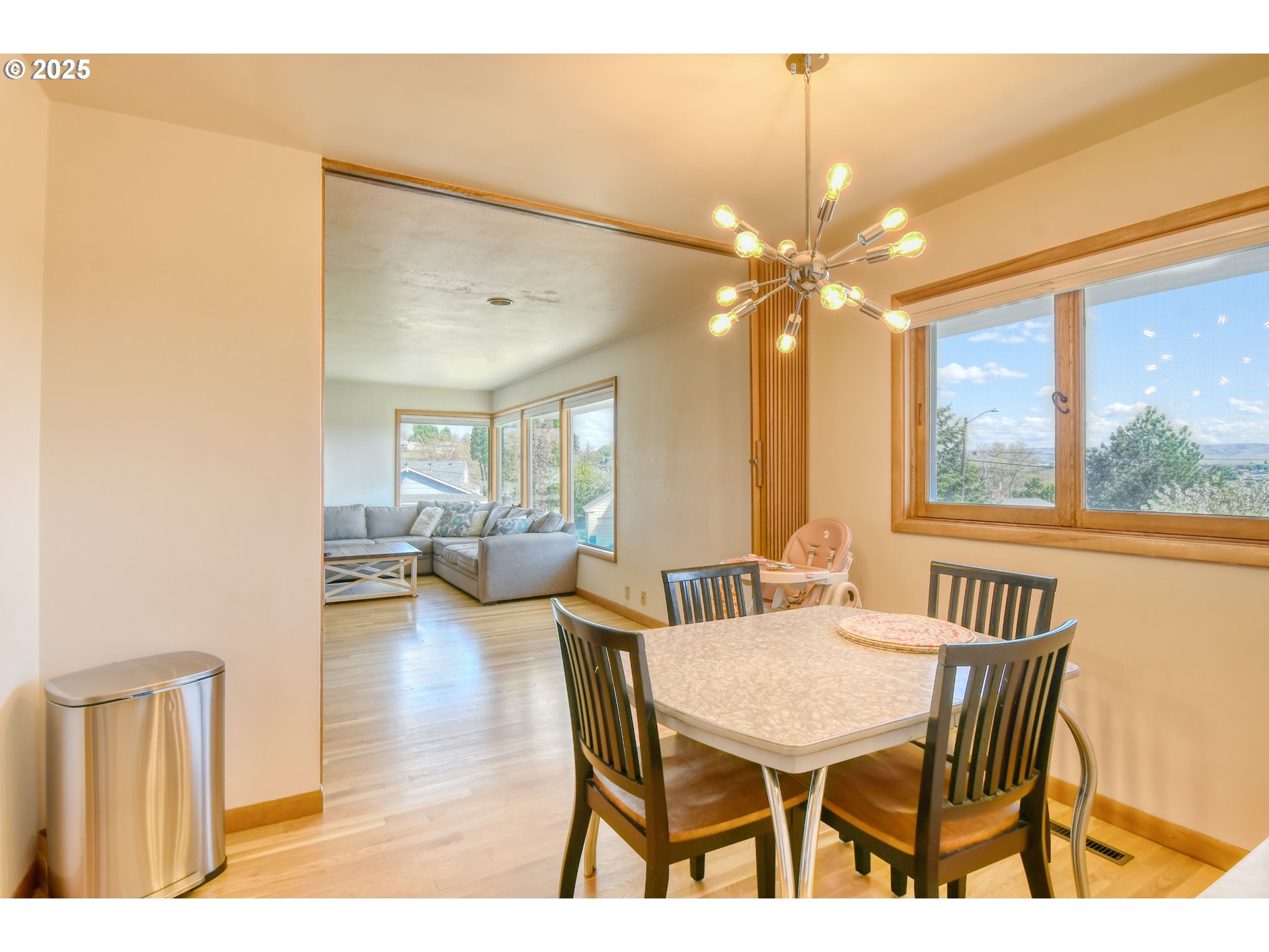 721 Northwest 10th Street Pendleton, OR 97801 - Photo 10 of 36 a view of a dining room with furniture and a chandelier