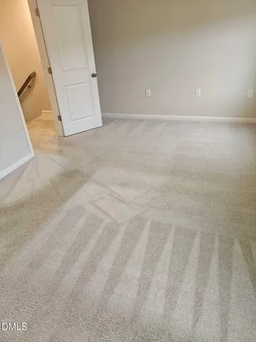 a view of a room with an empty space