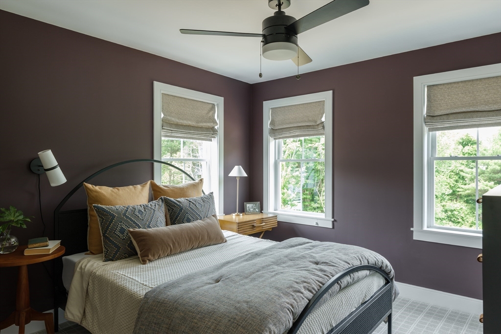 0 Oxbow Road, Unit 39 Raynham, MA 02767 - Photo 15 of 24 a bedroom with a bed and a window