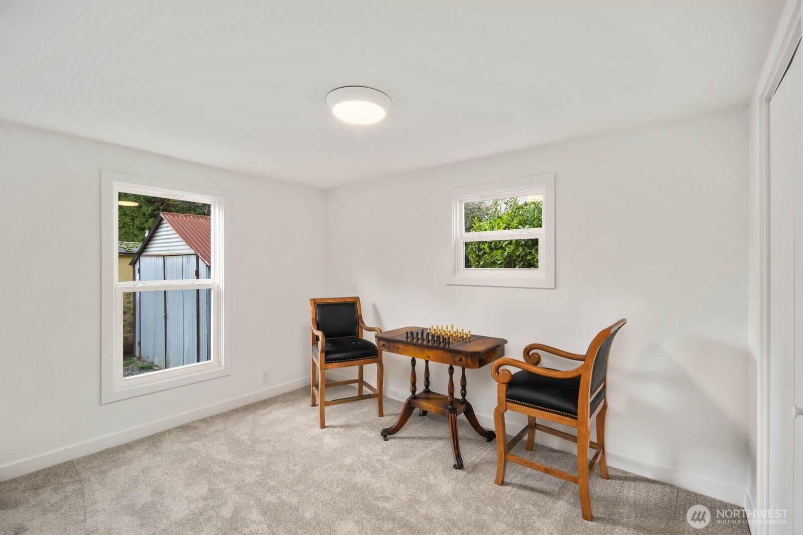3333 228th Street Southeast, Unit 69 Bothell, WA 98021 - Photo 21 of 26 a workspace room with furniture and a window
