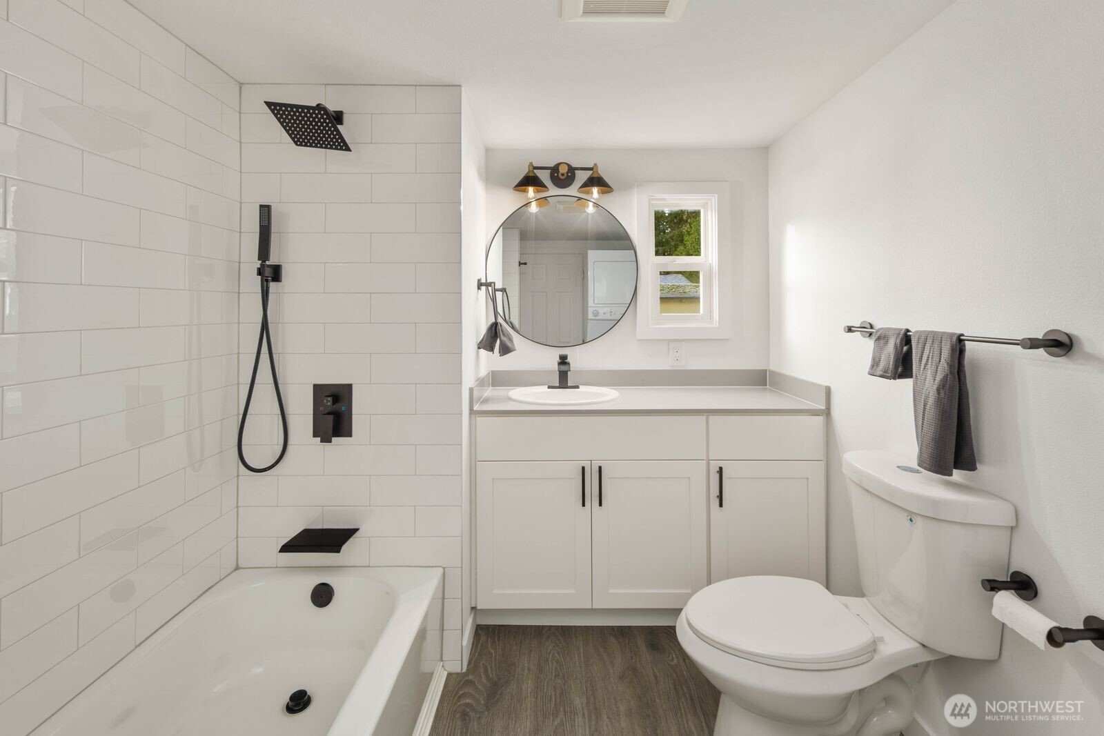 3333 228th Street Southeast, Unit 69 Bothell, WA 98021 - Photo 23 of 26 a bathroom with a sink toilet and shower