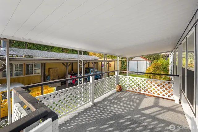 a kitchen with stainless steel appliances a refrigerator and microwave