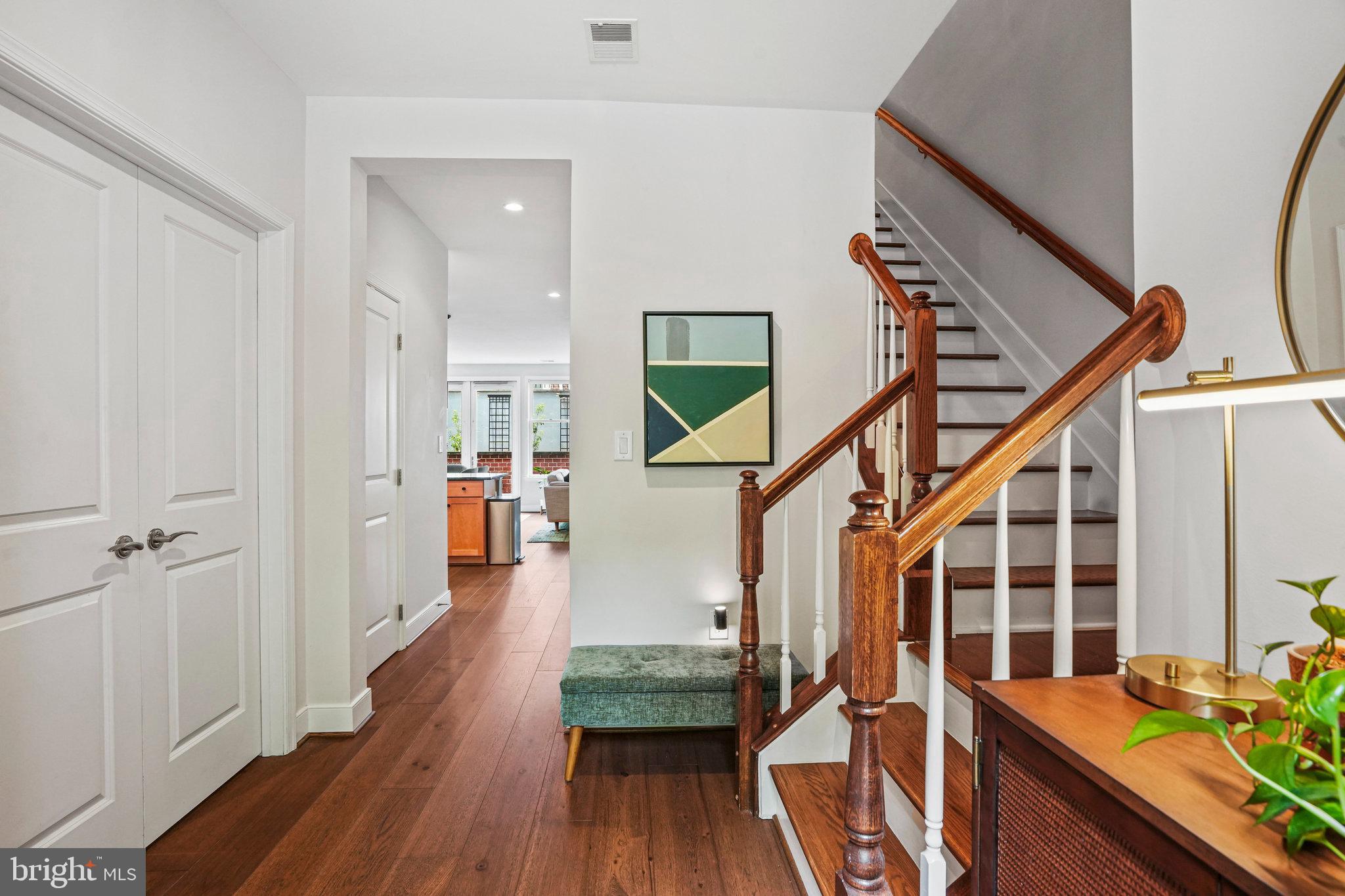 1811 14th Street North, Unit C104 Arlington, VA 22209 - Photo 3 of 44 a view of entryway and hall with wooden floor