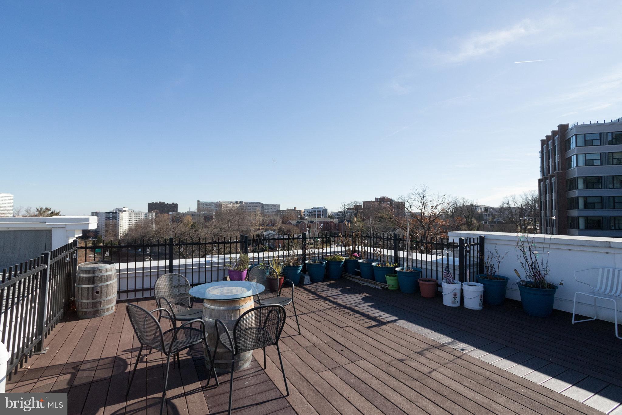 1811 14th Street North, Unit C104 Arlington, VA 22209 - Photo 36 of 44 a view of roof deck with patio