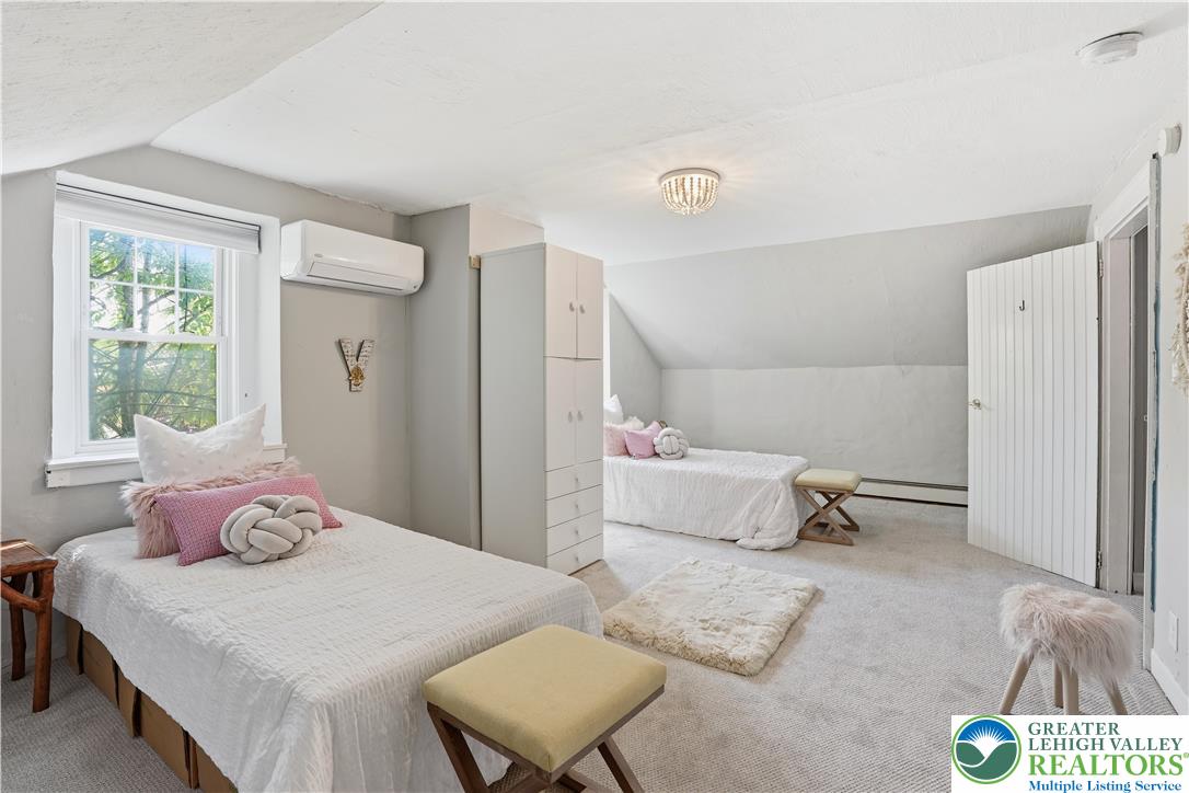 2014 Linden Street Bethlehem, PA 18017 - Photo 17 of 85 Two comfortable twin beds, plush carpets, and soft lighting create a peaceful retreat.
